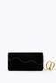 CLUTCH ONDA IN VELLUTO NERO