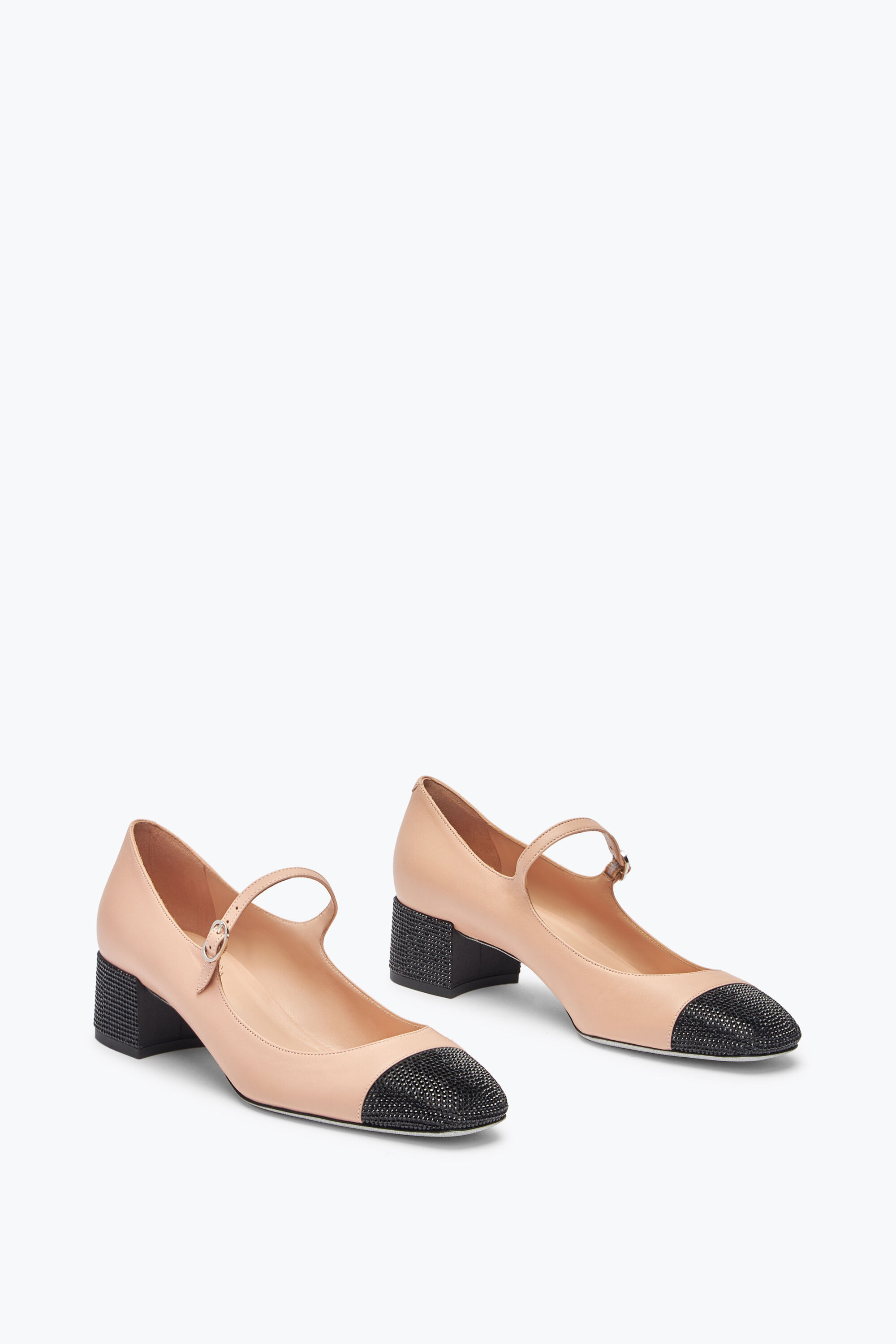 Nude and black pumps on sale