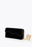 CLUTCH ONDA IN VELLUTO NERO